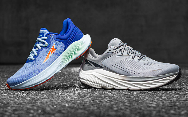 altra running shoes on shadowy background