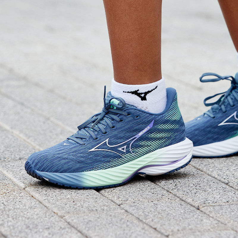 Women's Mizuno Wave Rider 28 running shoes in-use image