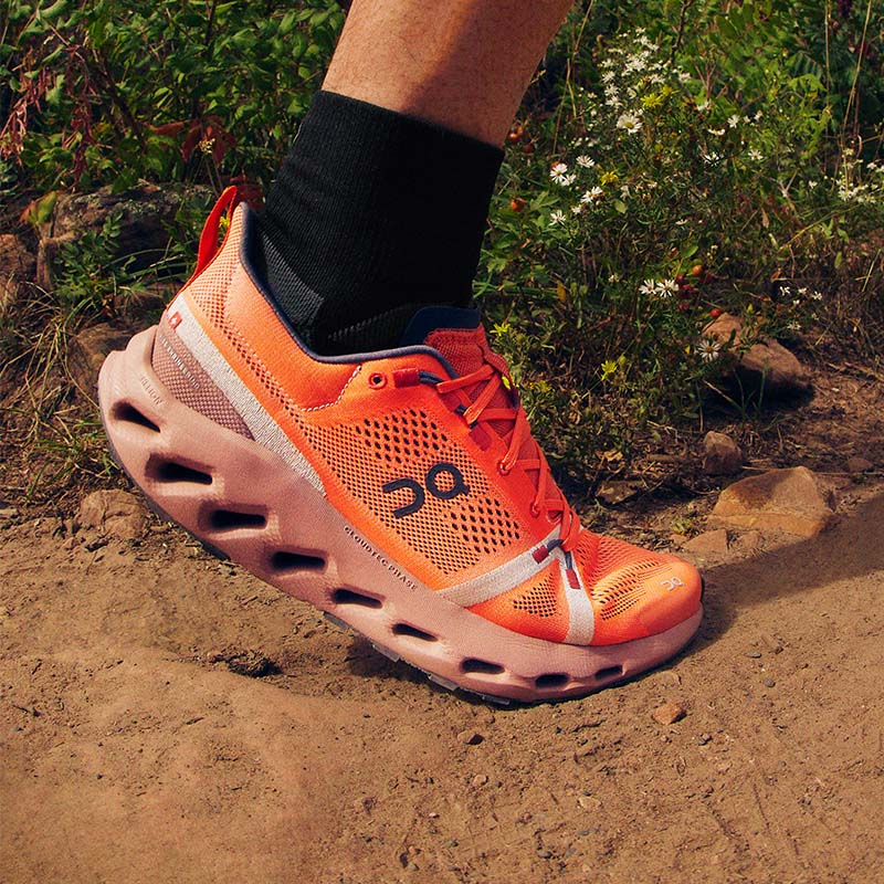 On Cloudsurfer Trail running shoes in-use image