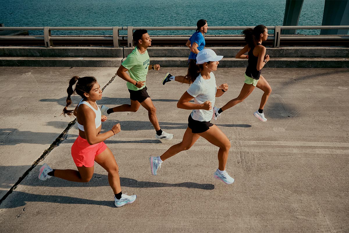 Image of people running in Brooks shoes and clothing